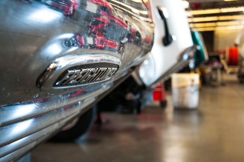 The front bumper of a semi truck in the service shop at Sacramento Truck Center.